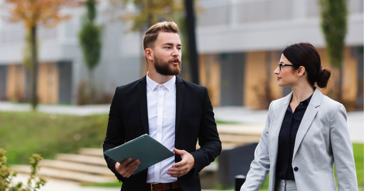 A BorrowerFirst adviser discussing mortgage broking and personal finance strategy options with a client